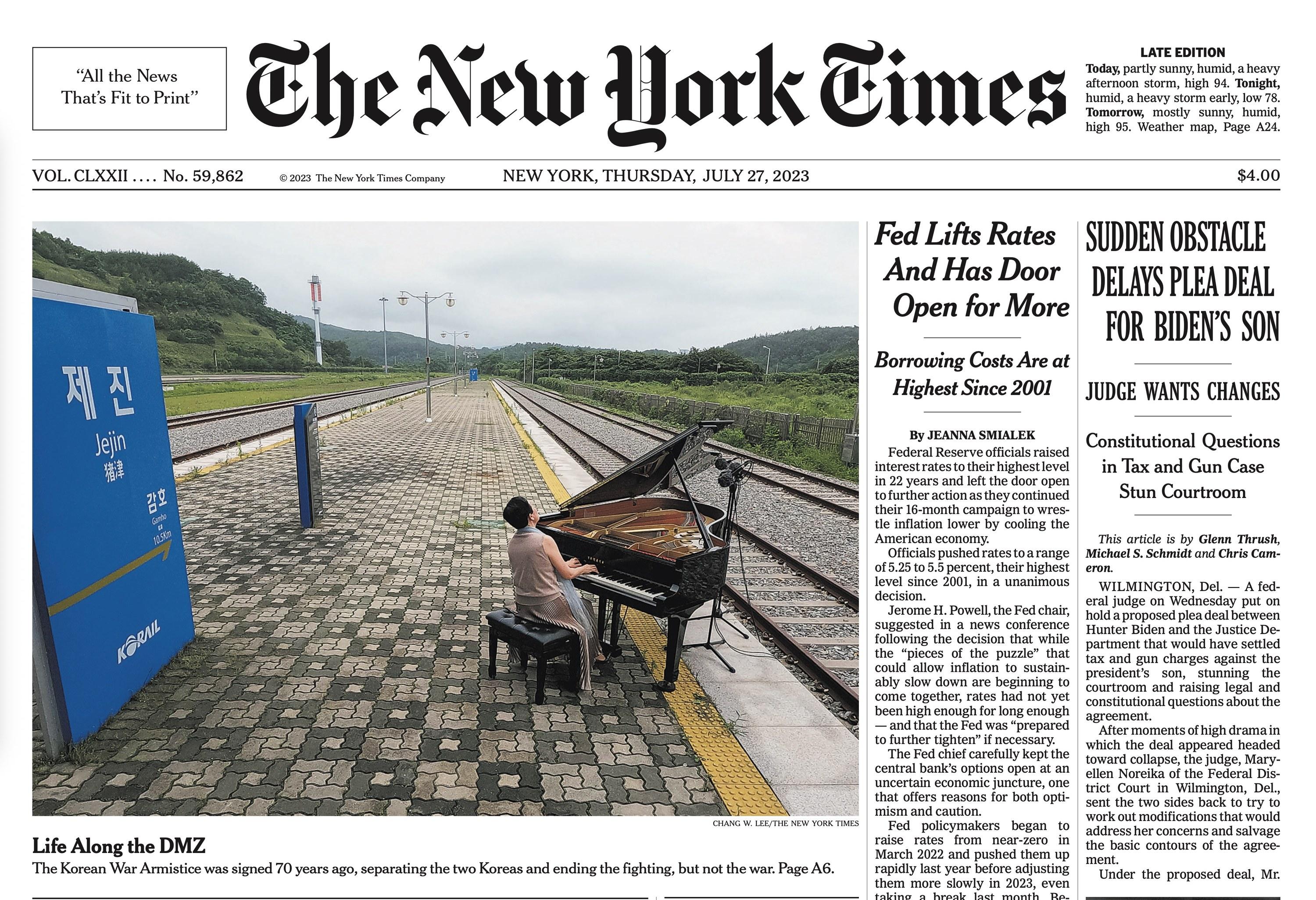 The New York Times front page of July 27, 2023, showing Mijung Im performing at a grand piano on the empty platform of Jejin Station near the Korean DMZ